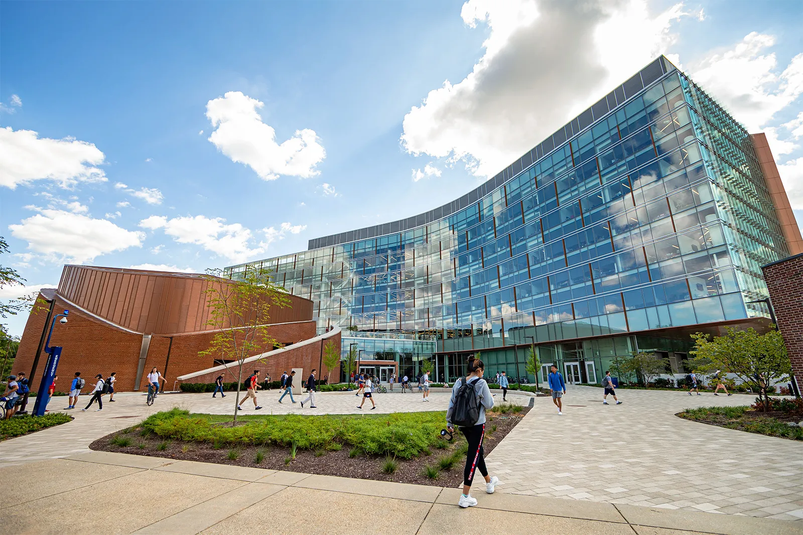Outside Iribe Center with students walking around