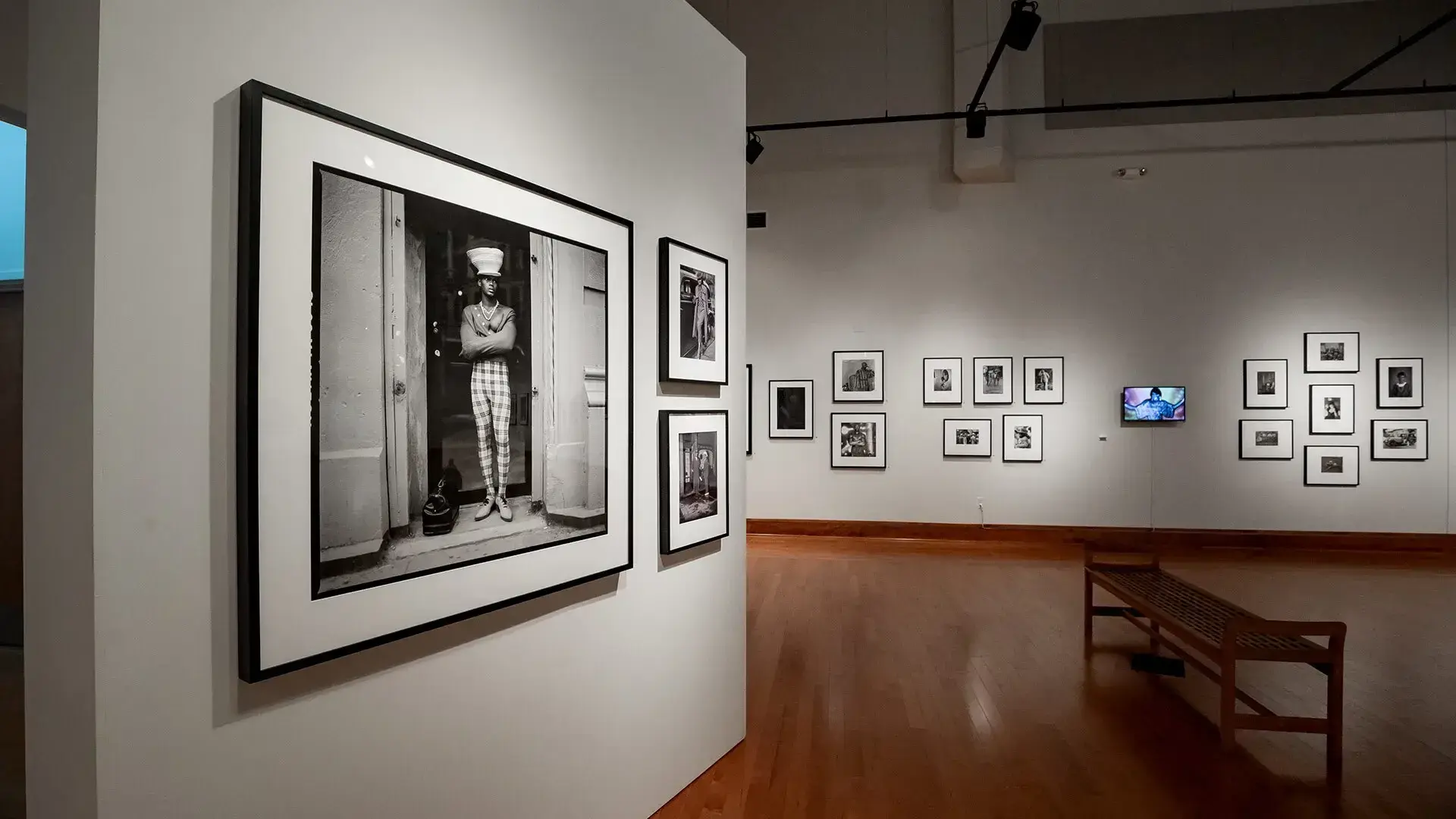 Exhibition in the Driskell Center. Black and white photography on the wall in an art gallery.