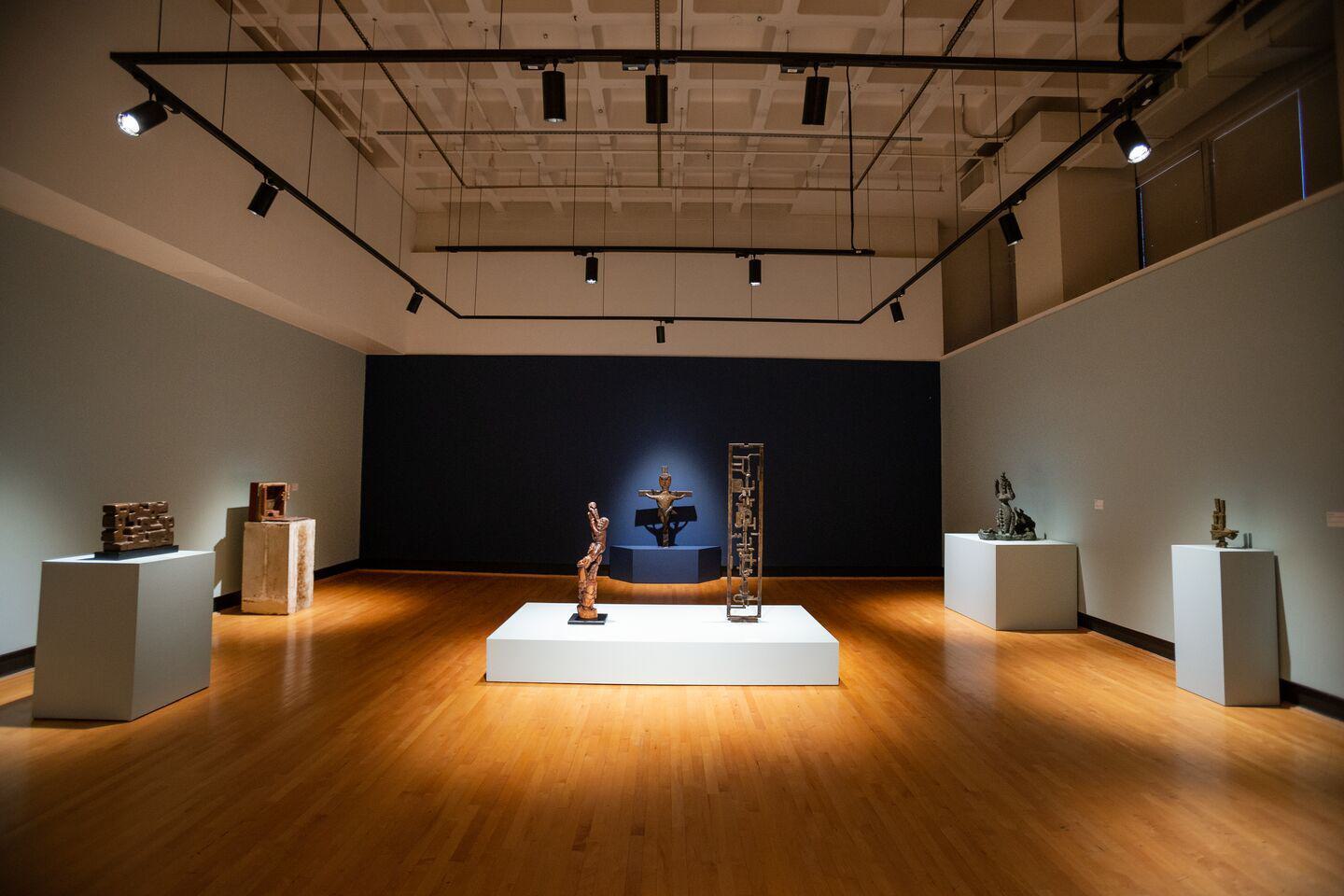 View of modern art gallery with sculpture. African or African inspired