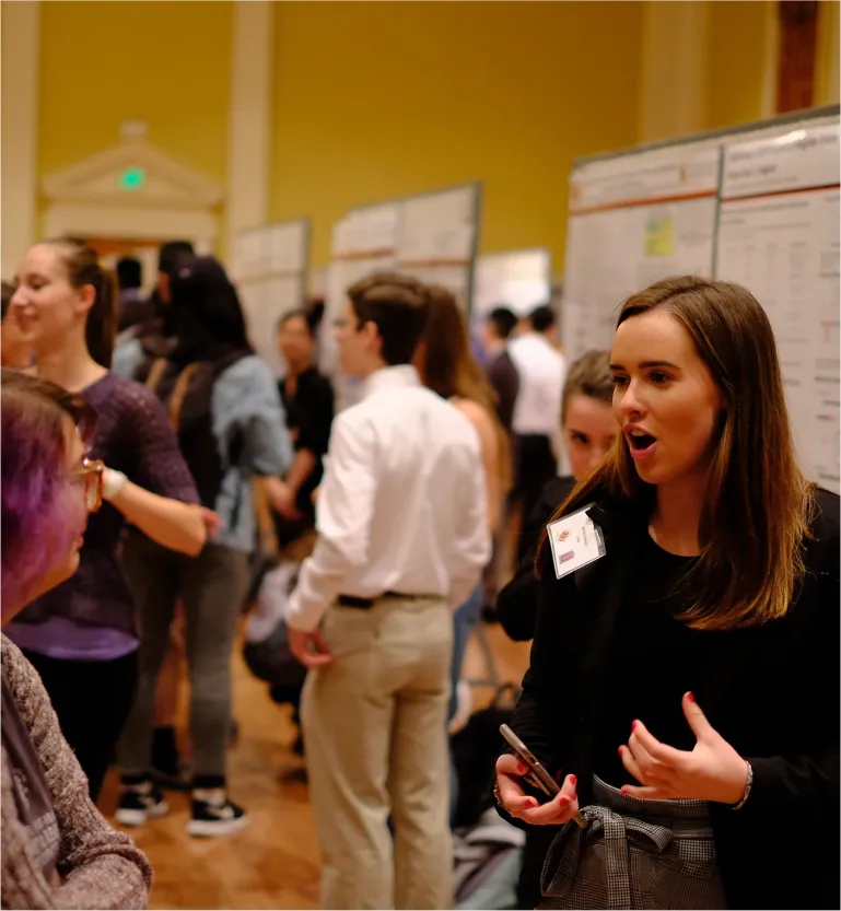 Group of individuals conversing during a convention
