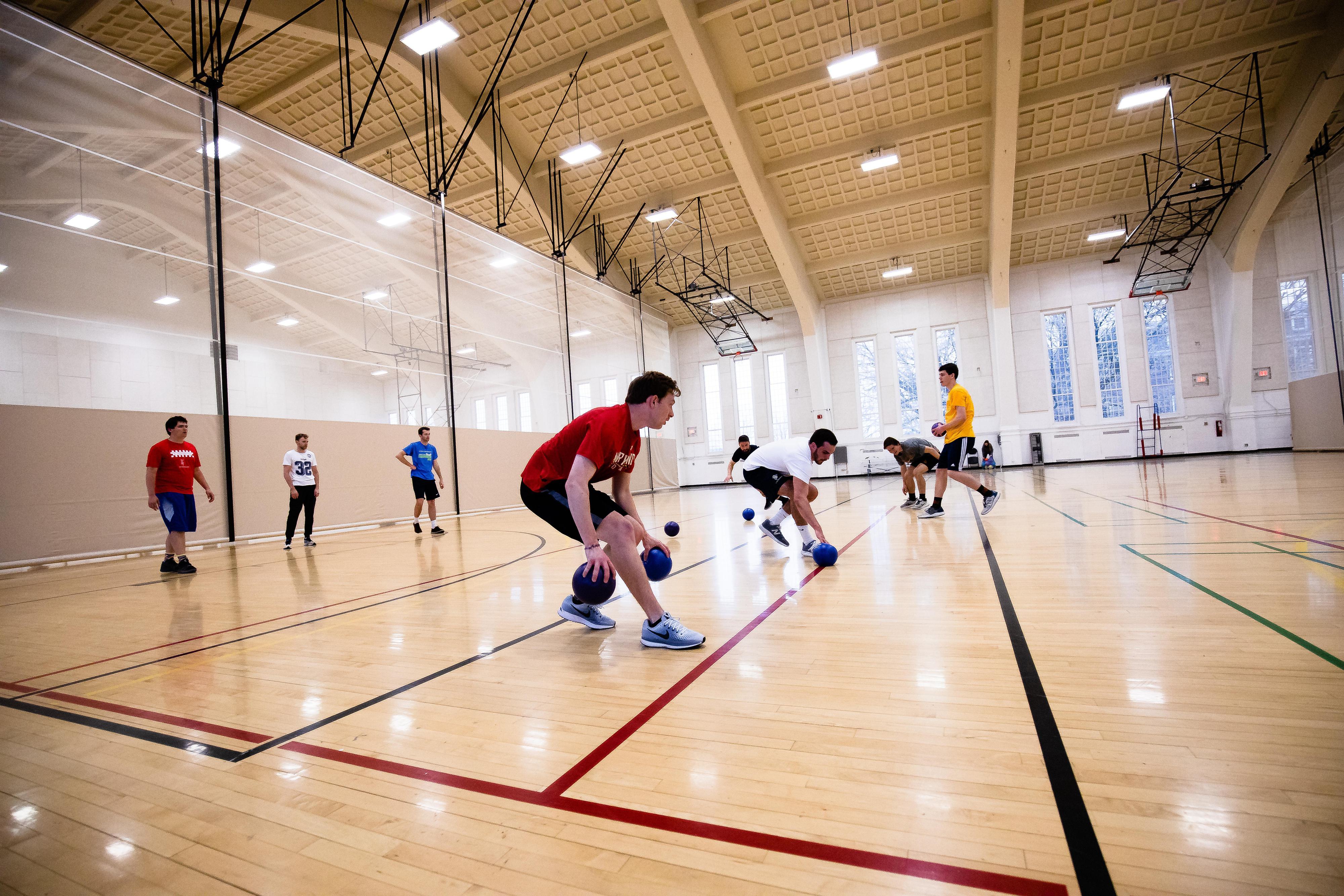 People playing sports indoors