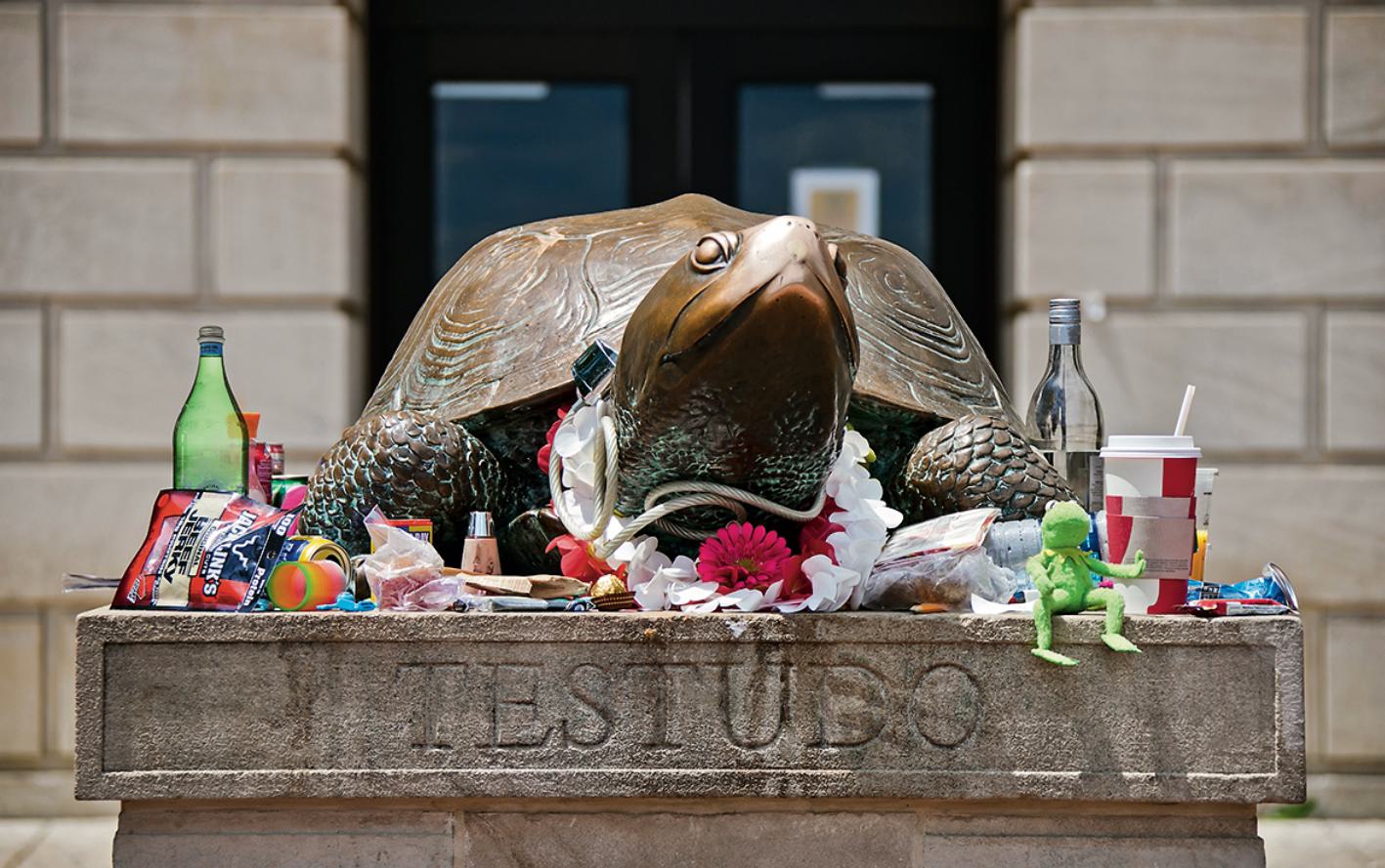 Offerings in front of Testudo, the bronze mascot
