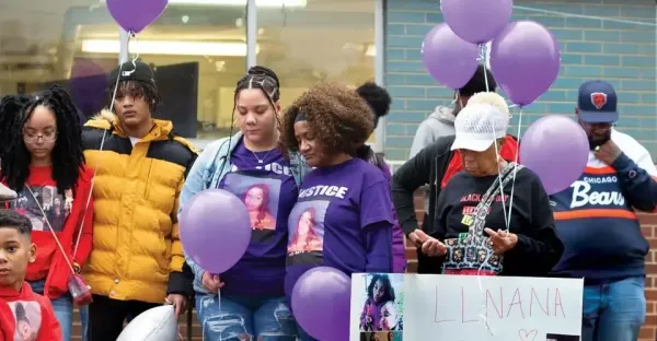 A group of mourners for a victim of violence