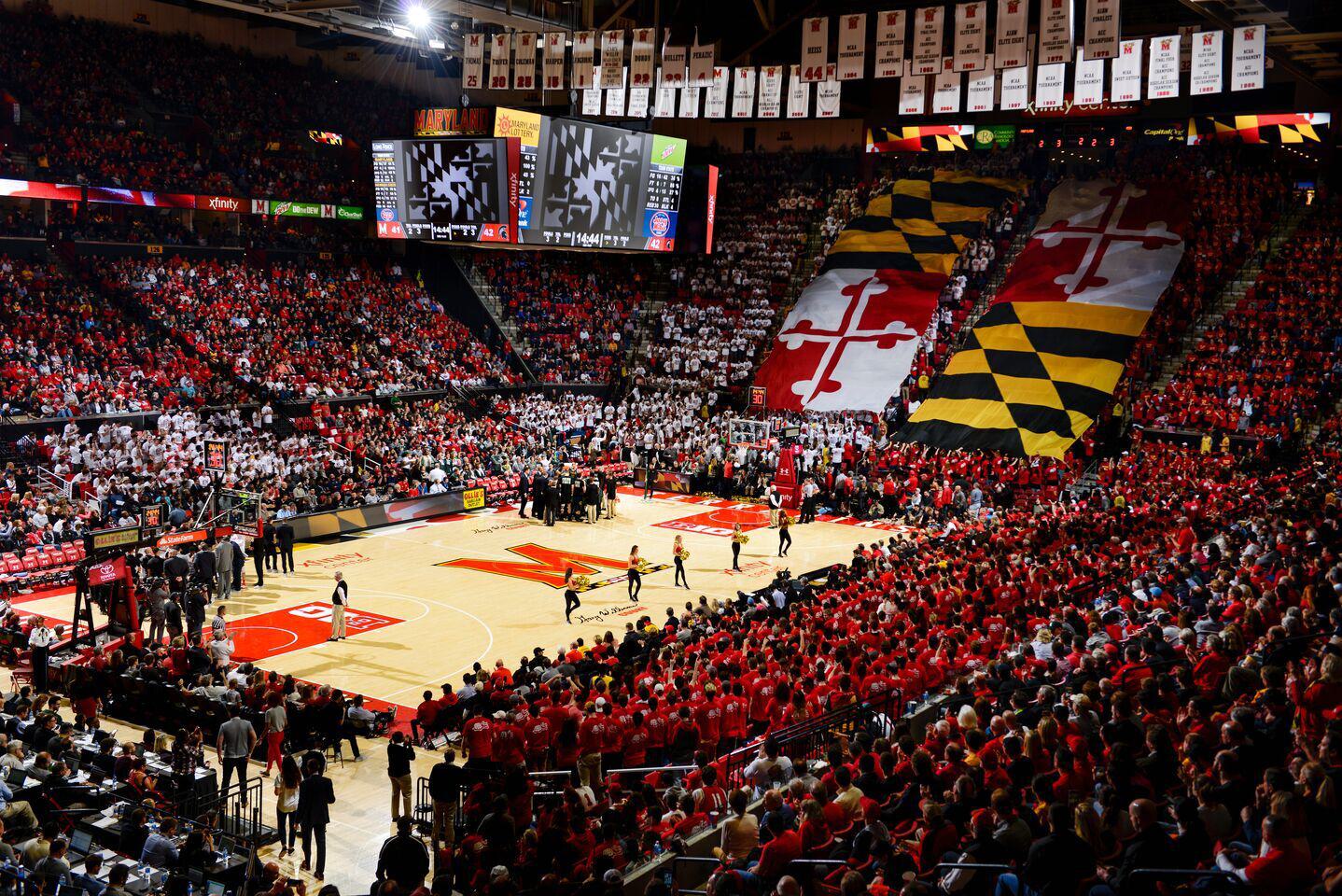 Indoor sports arena for basketball fans full of fans